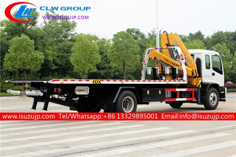ISUZU FTR flatbed wrecker truck with crane